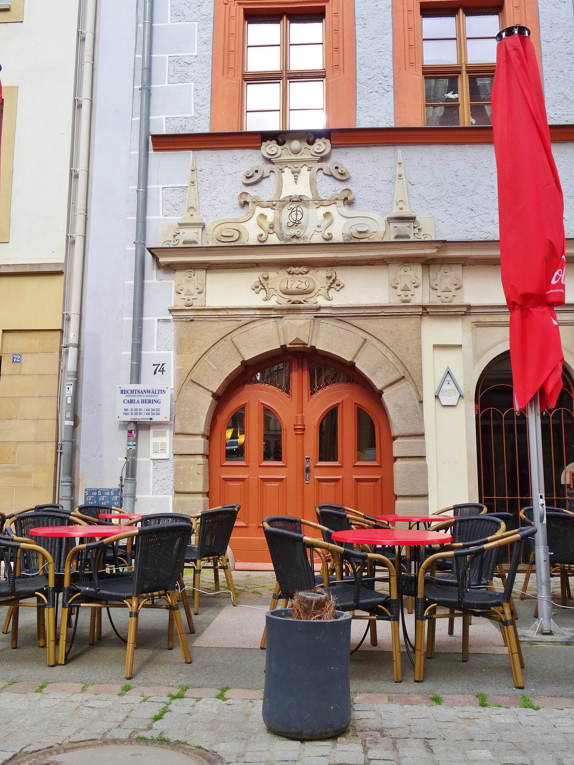 The Dohnaische Straße Pirna. During the morning the peoples walking over street. Children come with their teachers walking over the square and begging for being photographed. Old peoples watching out of the windows. The weather is fresh and you breath clean air. Nobody discriminates each other not even with a bad view.